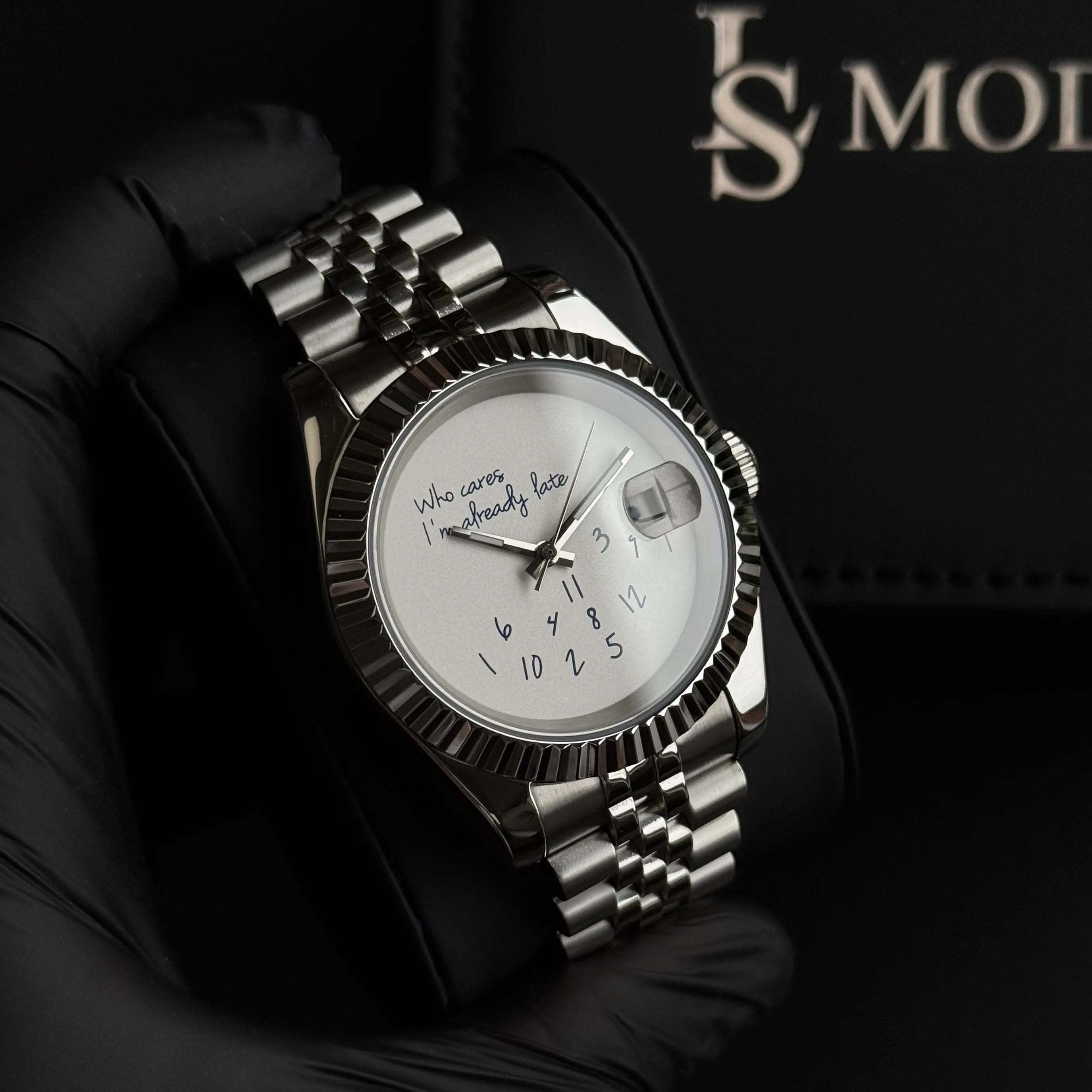 SeikoMod Datejust "Who Cares I'm Already Late" watch with white dial and blue markers, customized via the configurator